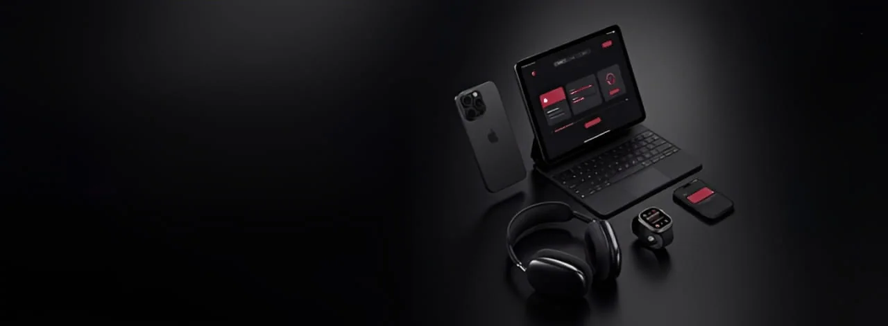 Os prêmios sobre uma mesa escura: celular, tablet com teclado, fone e relógio.